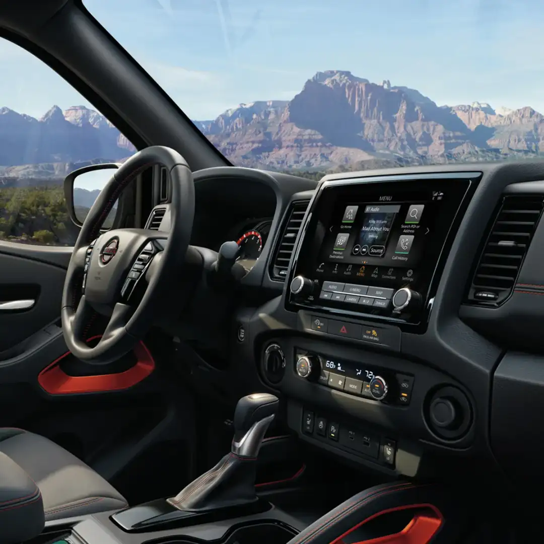 Nissan frontier interior with mountain in the background