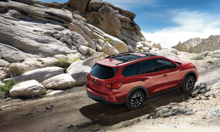 2020 Nissan pathfinder driving a rocky road