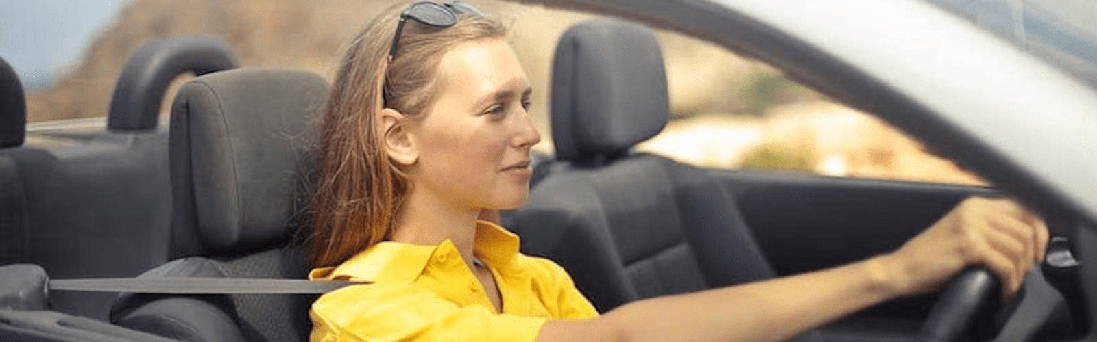 lady sitting in car driving