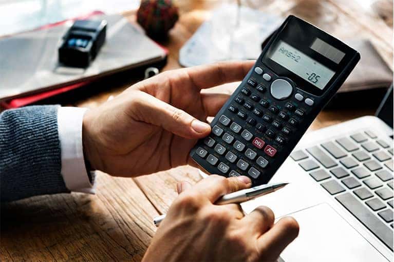 Hands Holding Calculator