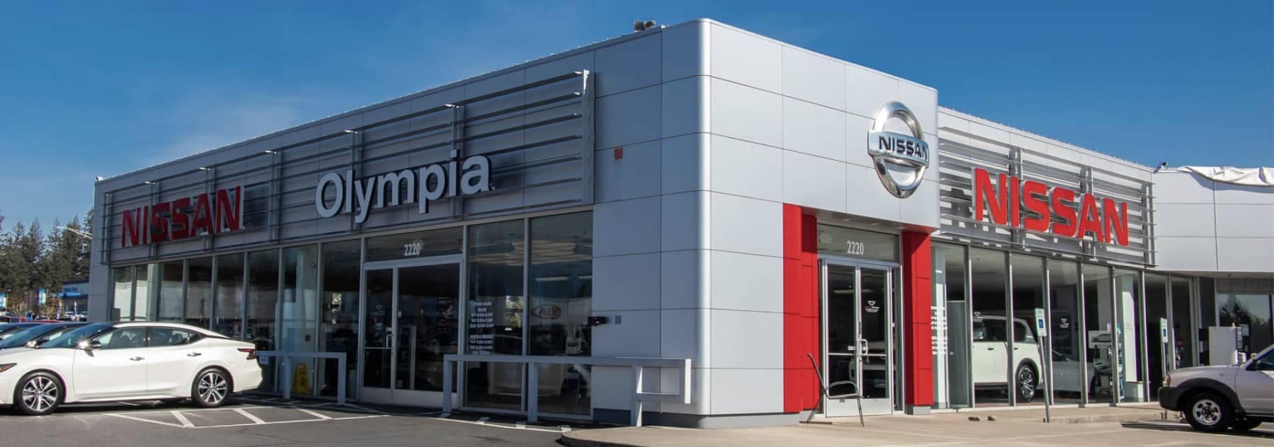 Olympia Nissan Dealership During the day from the outside