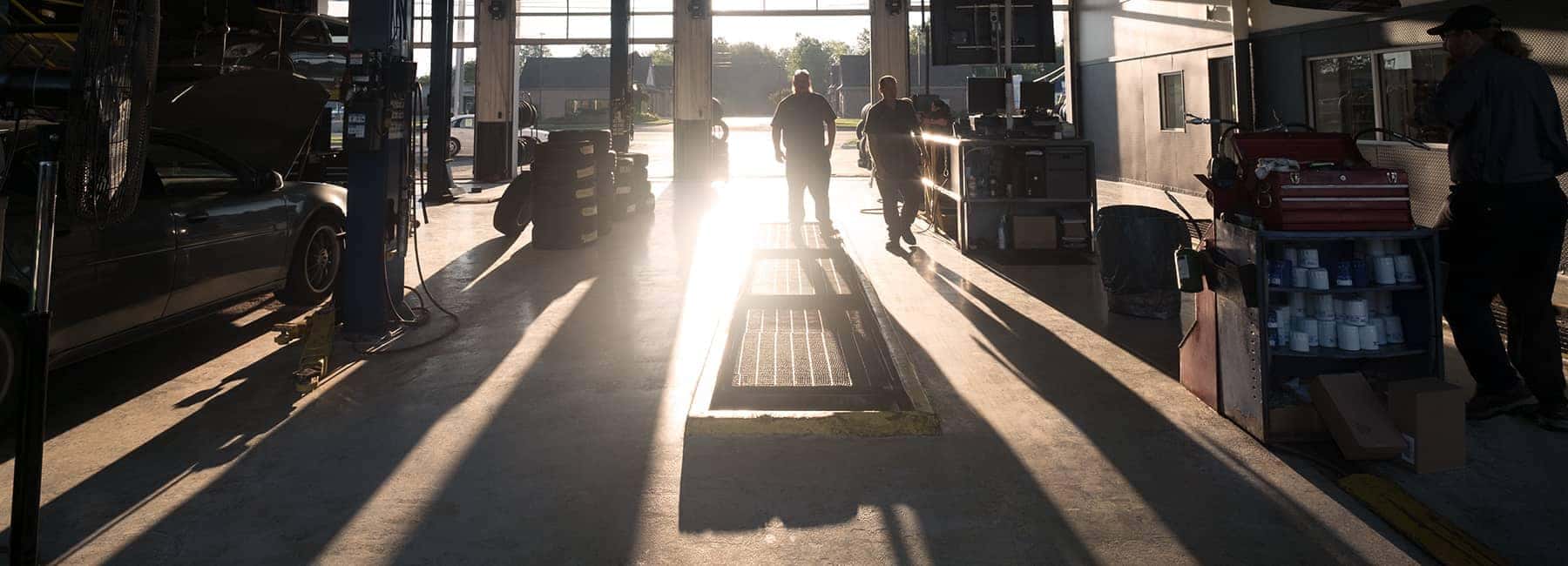 GM service bay with sun shingin in