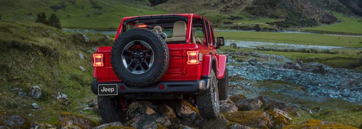 red jeep in rocky terrain