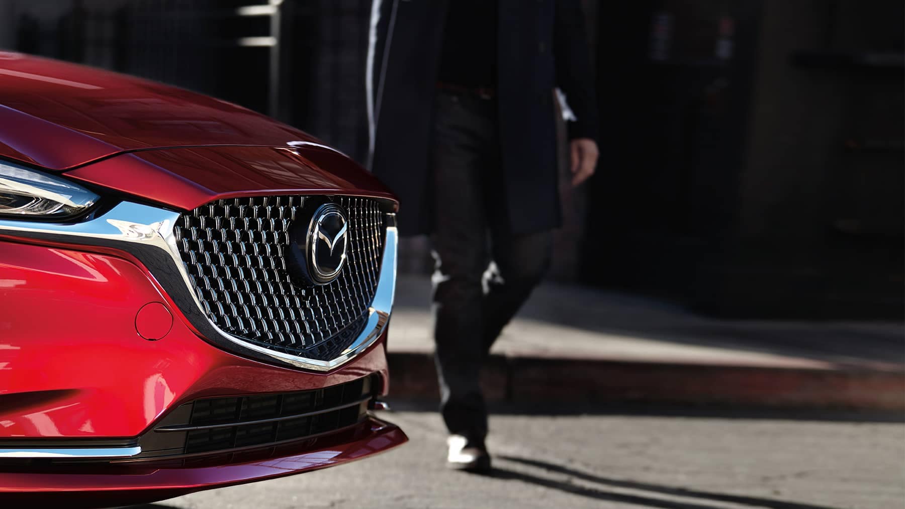 2020 Mazda 6 Sports Sedan Front Grille Closeup with Man Walking Behind