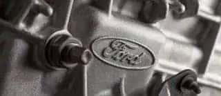 close up of Ford logo on engine