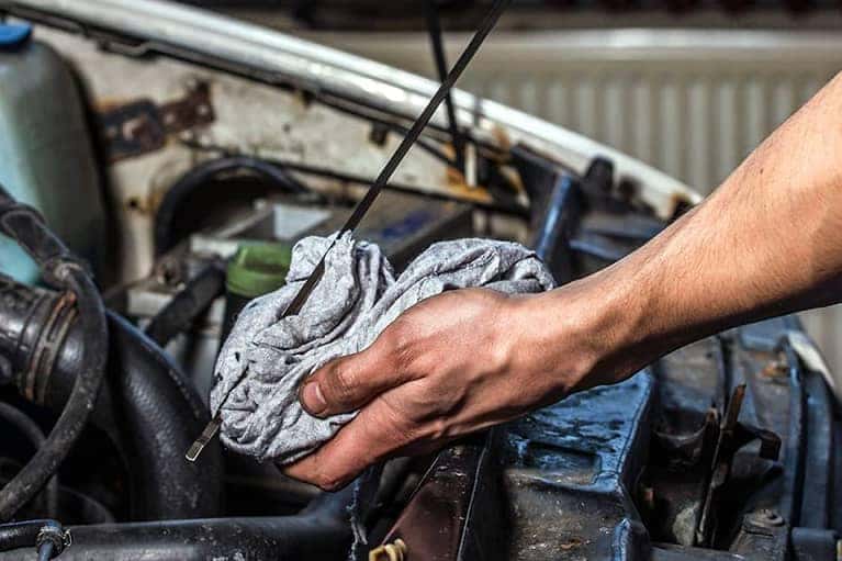 Checking oil on a vehicle