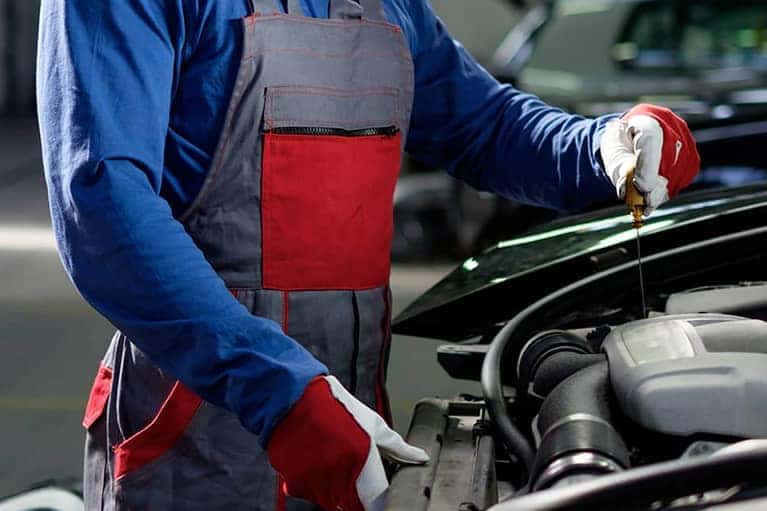 Checking fluids on a vehicle