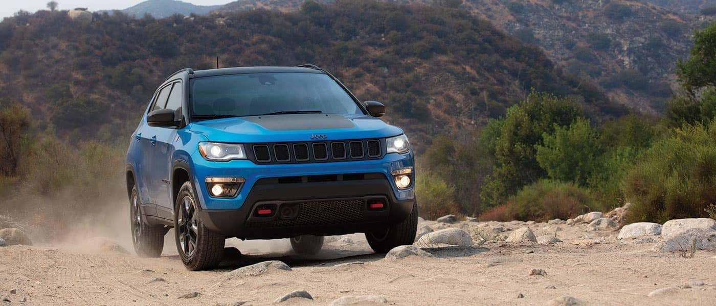 2019 Jeep Compass driving on dirt