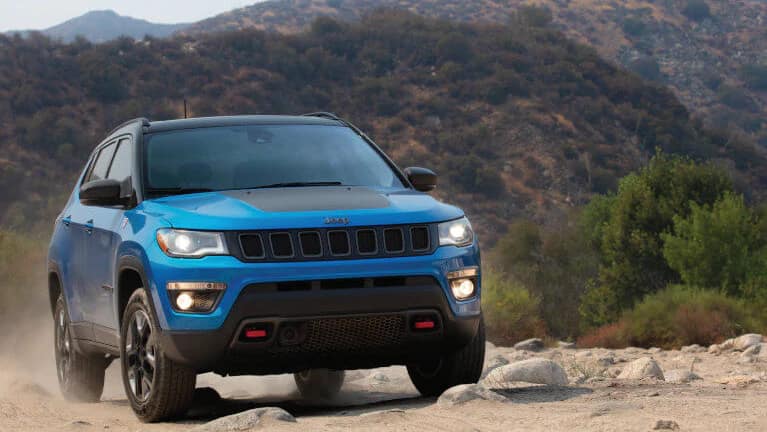 2019 Jeep Compass on dirt path