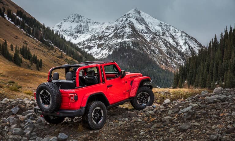Red 2019 Jeep Wrangler Rubicon on hill