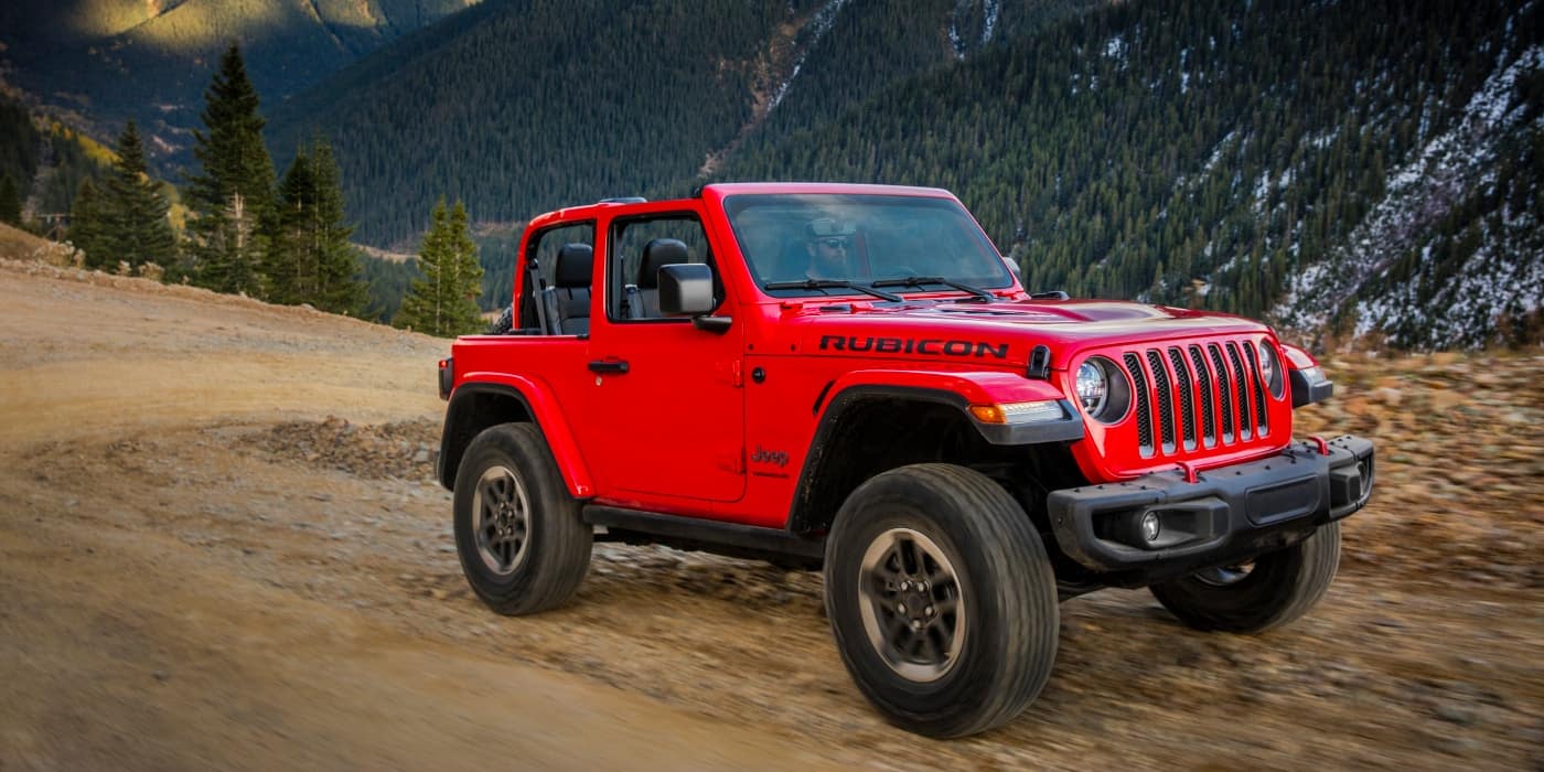 Red 2019 Jeep Wrangler on road