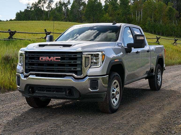A silver 2024 GMC Sierra 2500 parked.