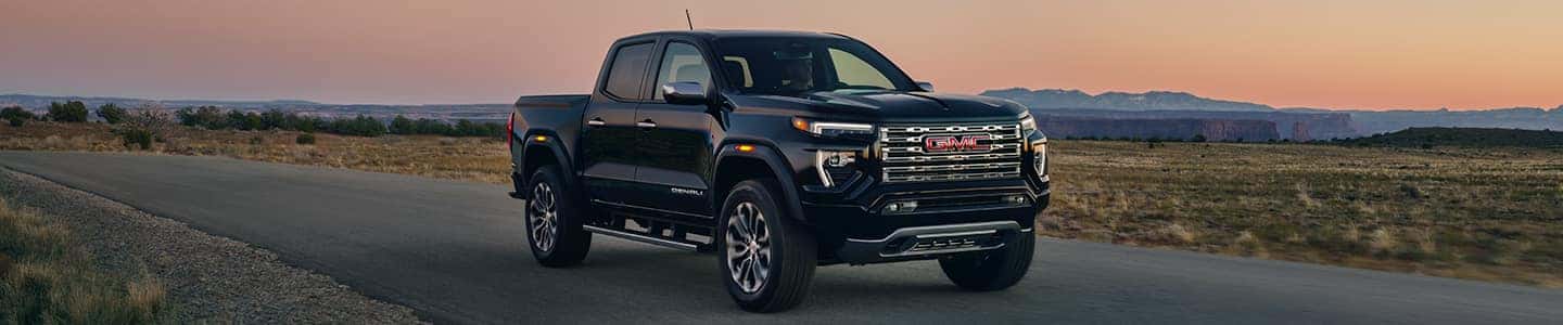 A black 2024 GMC Canyon Denali parked.