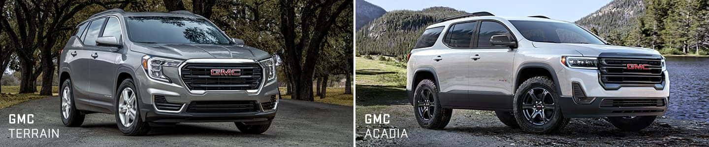 A silver GMC Terrain and a white GMC Acadia.