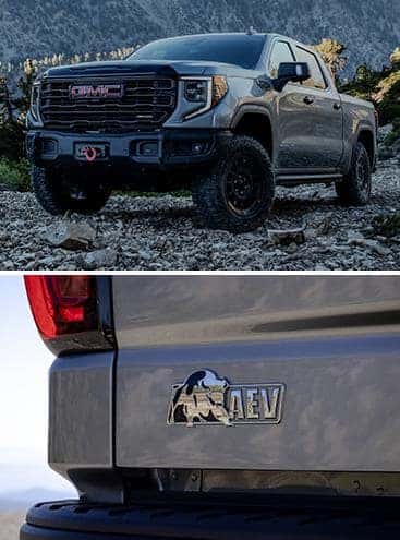 A 2023 GMC Sierra 1500 AT4X AEV Edition parked over an AEV badge.