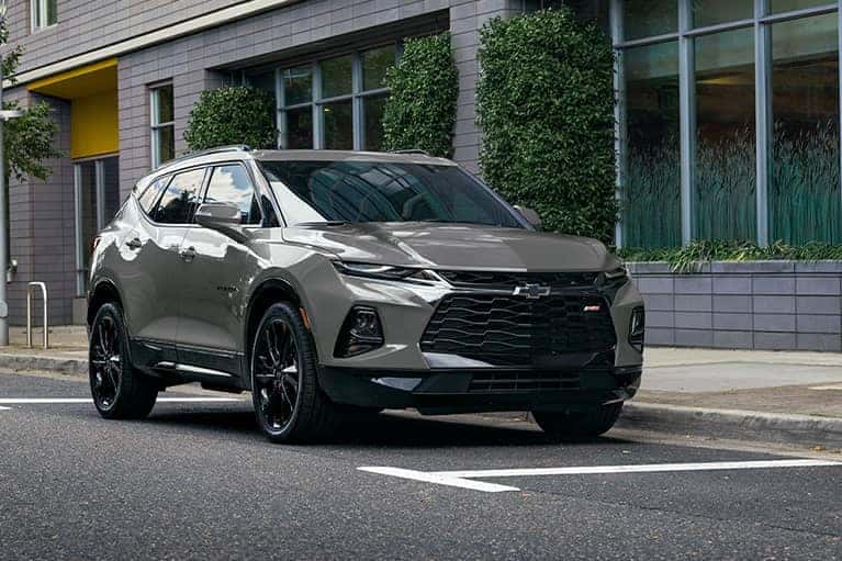 2021 Chevrolet Blazer parked in front of a city building