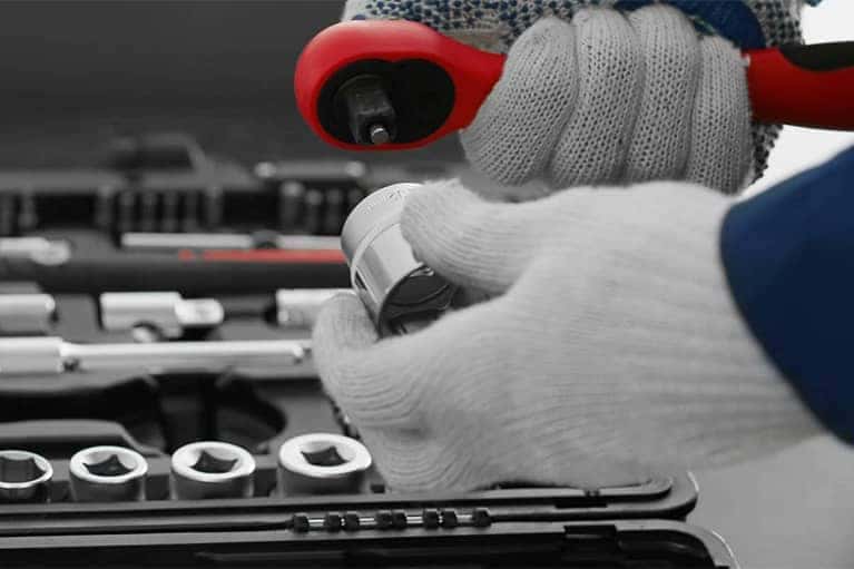 Gloved Mechanic with Tools
