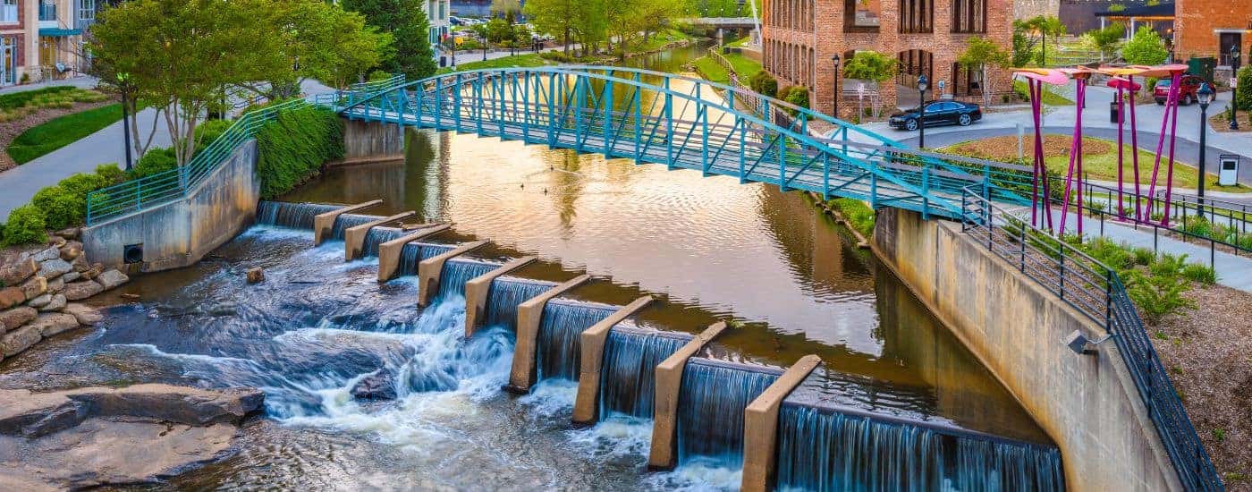 A river and bridge are shown in Greenville, SC.
