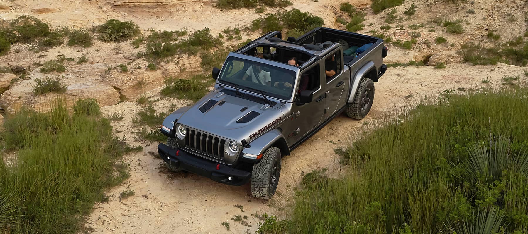 2020 Jeep Gladiator driving on rocky mountain