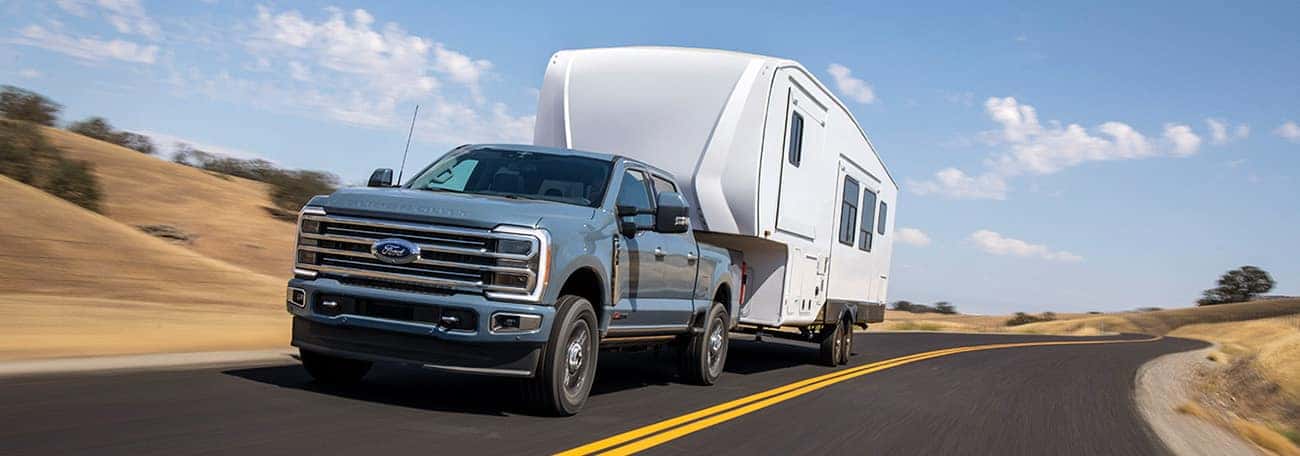 Ford Super Duty towing a camper.