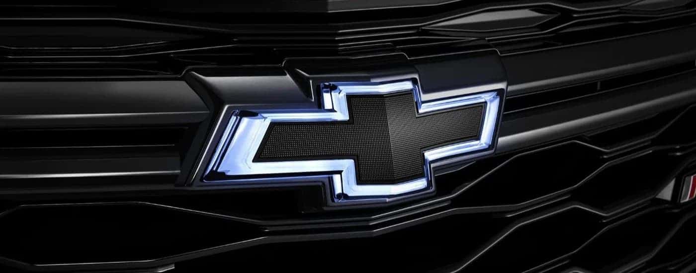 Close-up on the grille and badging of a 2024 Chevy Equinox RS.