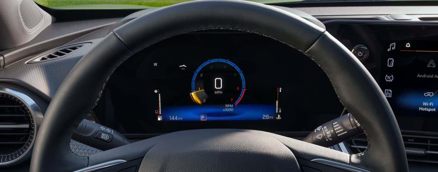 The digital instrument cluster in a 2025 Chevy Trax for sale near Cypress.