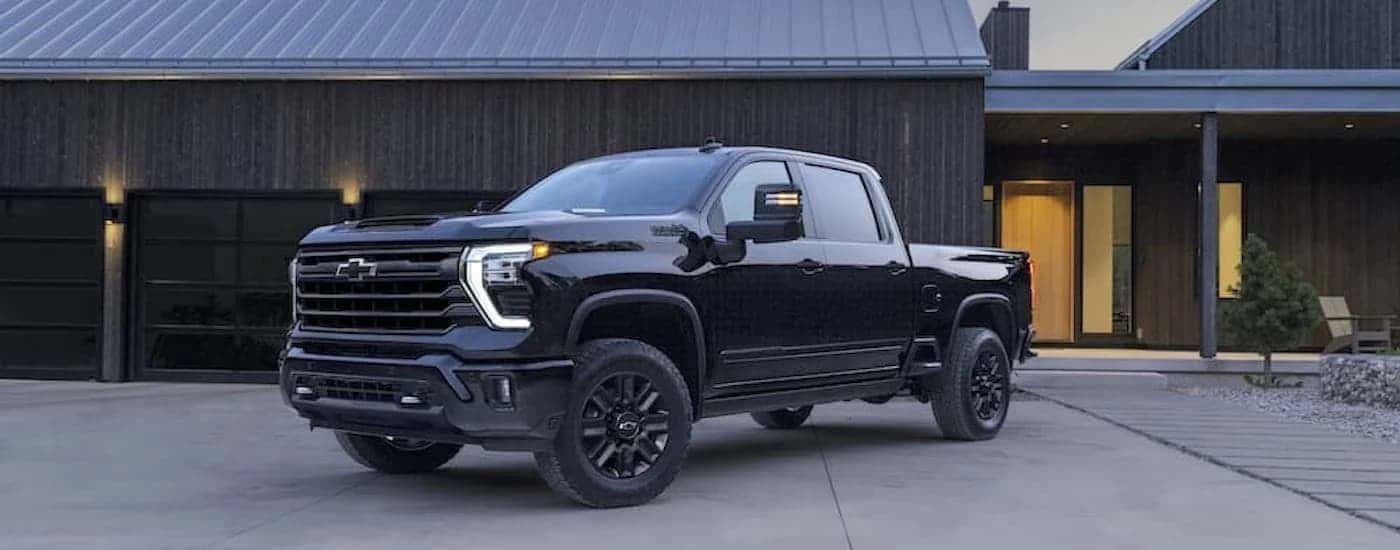 A black 2024 Chevy Silverado 2500 HD.