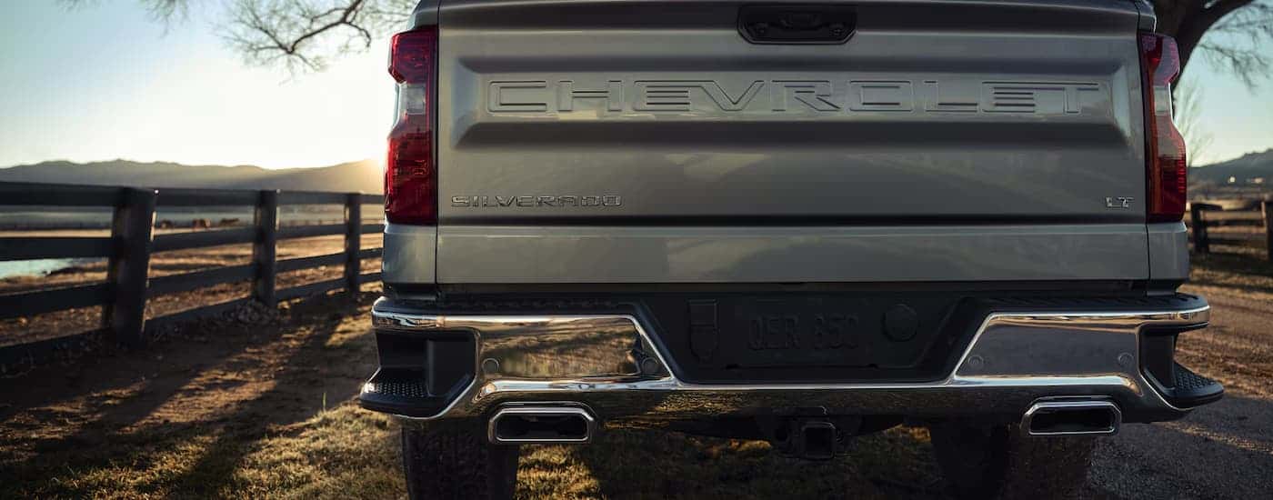 Tailgate on a gray 2026 Chevy Silverado parked off-road