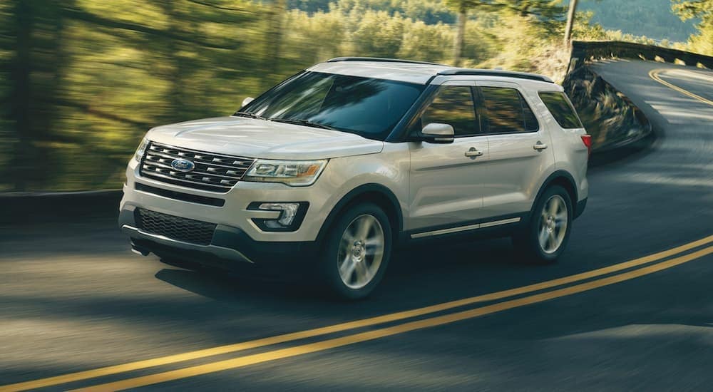 A white 2019 Ford Explorer is shown from the front at an angle after leaving a Ford dealership in Central Michigan.