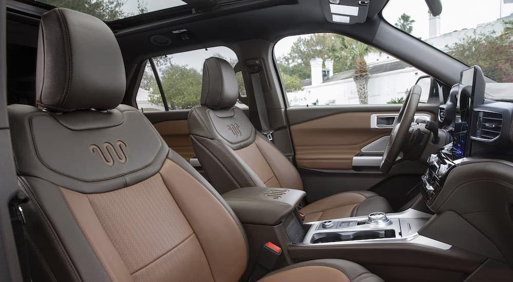 The brown interior of a 2021 Ford Explorer King Ranch is shown after leaving a used car dealer near you.