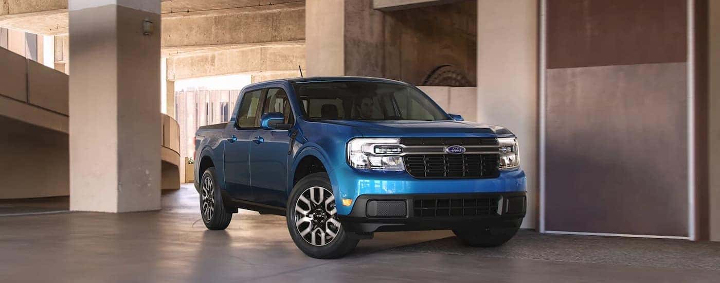 A blue 2022 Ford Maverick is shown after leaving a Carmel Ford dealer.