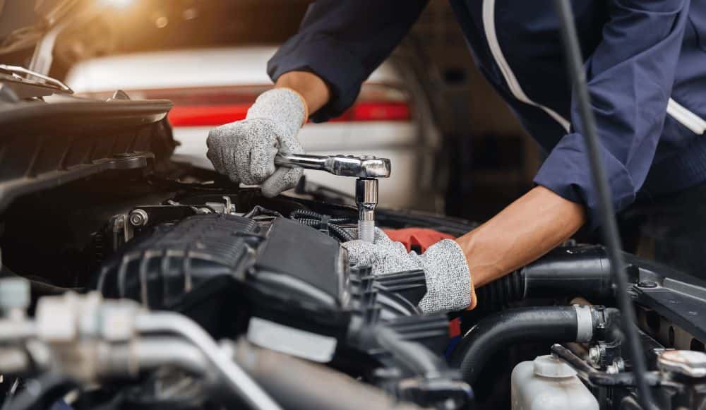 technician working on vehicle