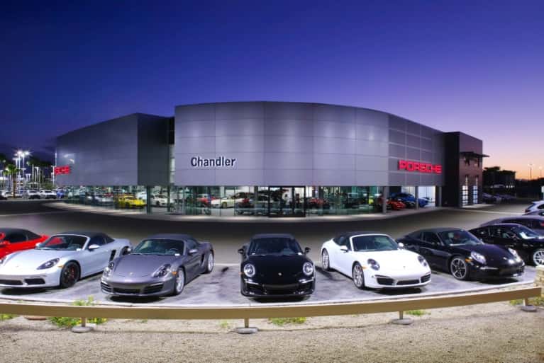 Exterior shot of a modern Porsche dealership