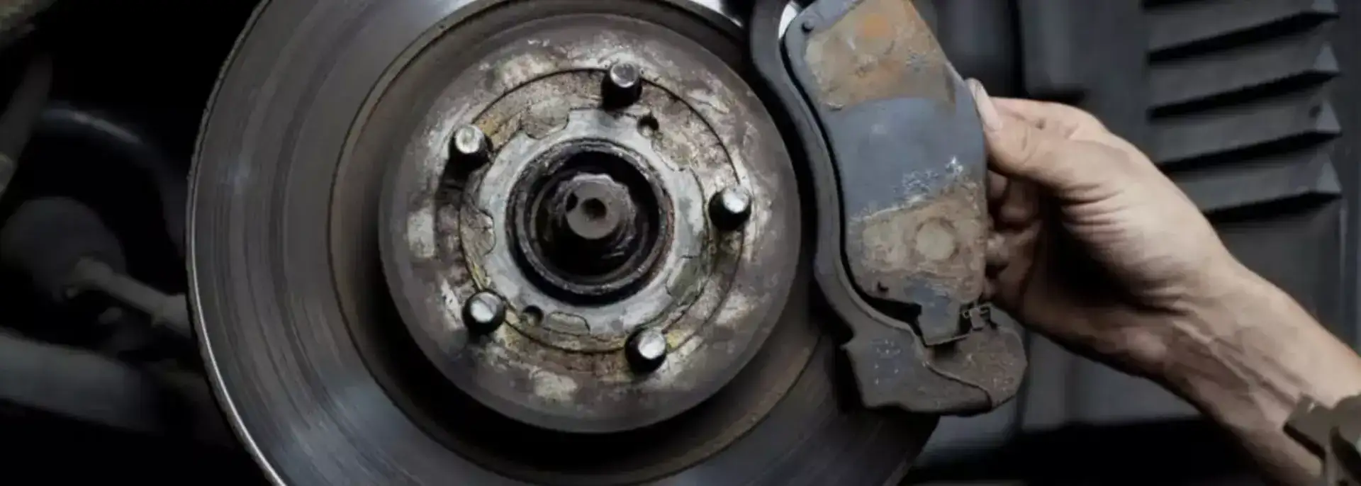 Mechanic changing brake pad