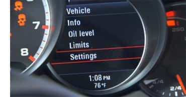 Step 3 - Select "Settings" on the Multi-Function Display How do I adjust the clock in my Porsche - Step 3 - In dash display of a Porsche, "Settings" highlighted