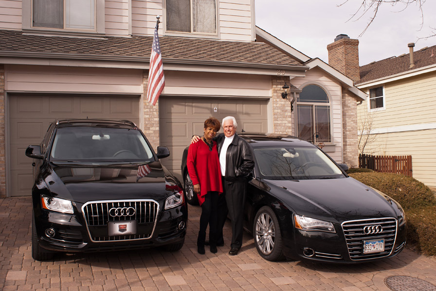 Dan and Vaniece Sinawski with their Audi Q5 and A8L