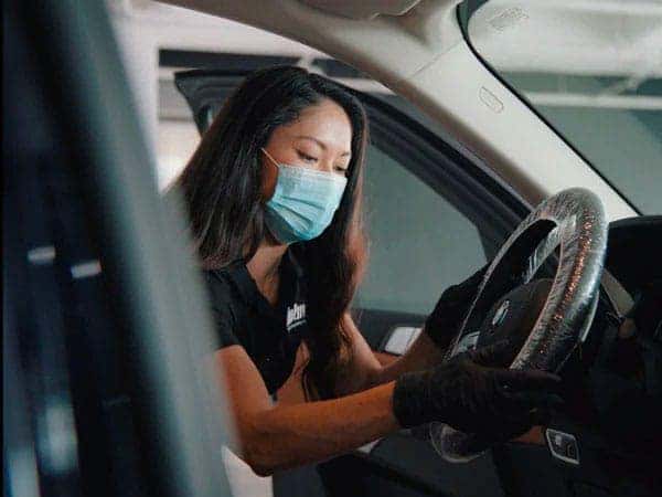 employee-wiping-steering-wheel