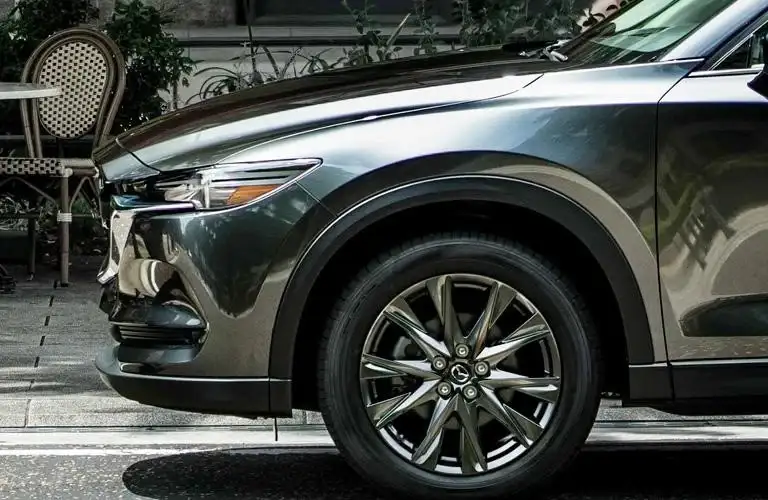 front of silver mazda cx-5 vehicle from left