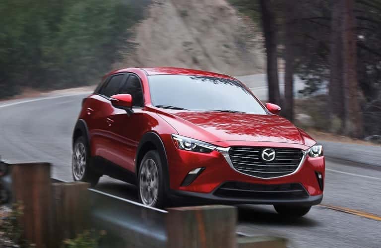2021 Mazda CX-3 driving around curve