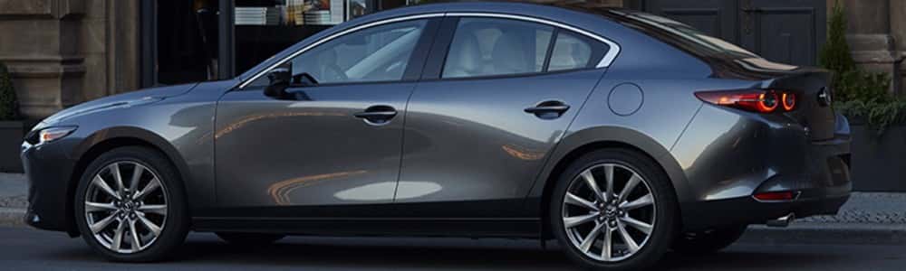 2019 Mazda3 parked outside restaurant