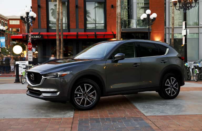 dark gray mazda cx-5 on city road