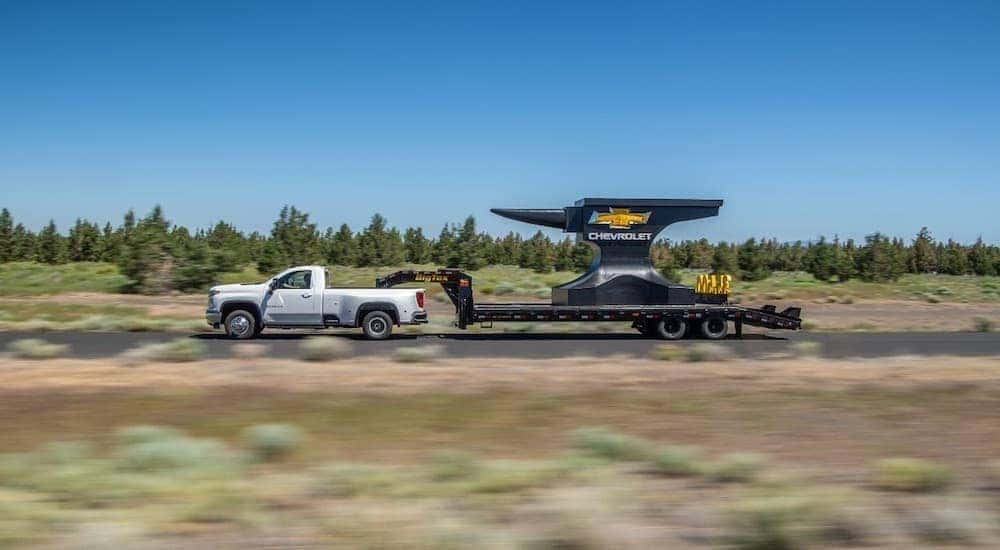A 2020 Silverado 3500 HD is towing, something you want to consider when asking yourself '1500 vs 2500 and asking, “Do I need a Super Duty?', a large trailer.
