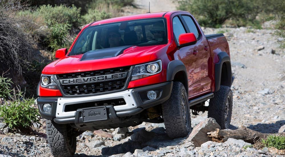 A red 2020 Colorado ZR2 Bison is driving over rocks near Bethlehem ,PA.