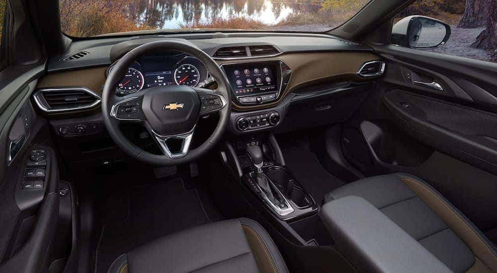 The black and brown interior of a 2021 Chevy Trailblazer is shown.