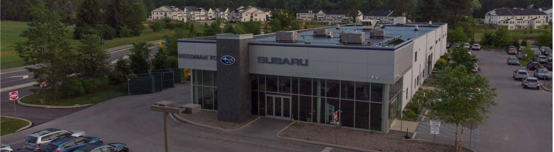 An exterior view of the top of a Subaru Dealership Building