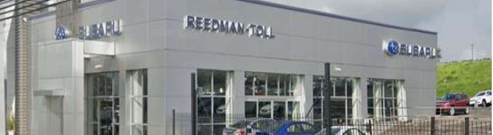 An exterior view of the top of a Subaru Dealership Building