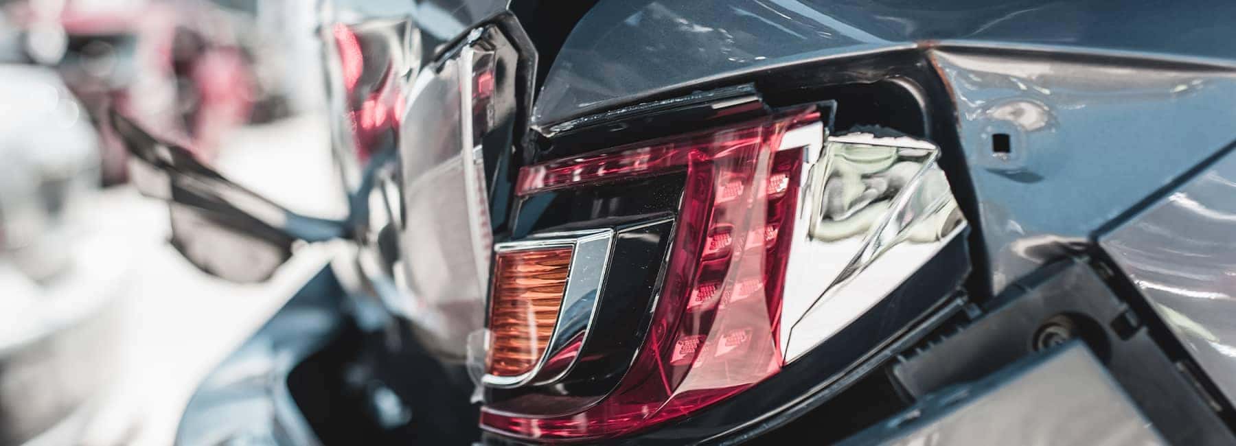 Rear crumpled bumper after car collision