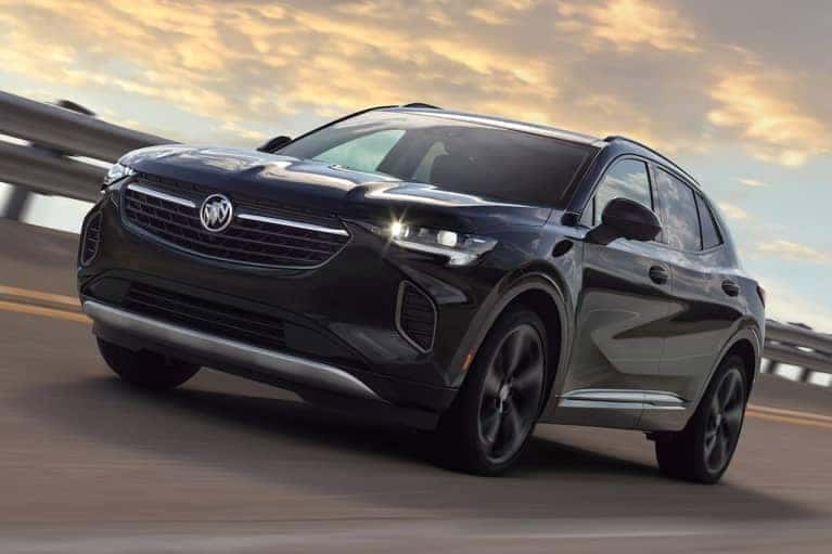 2021 Black Buick Envision speeding on the highway_mobile