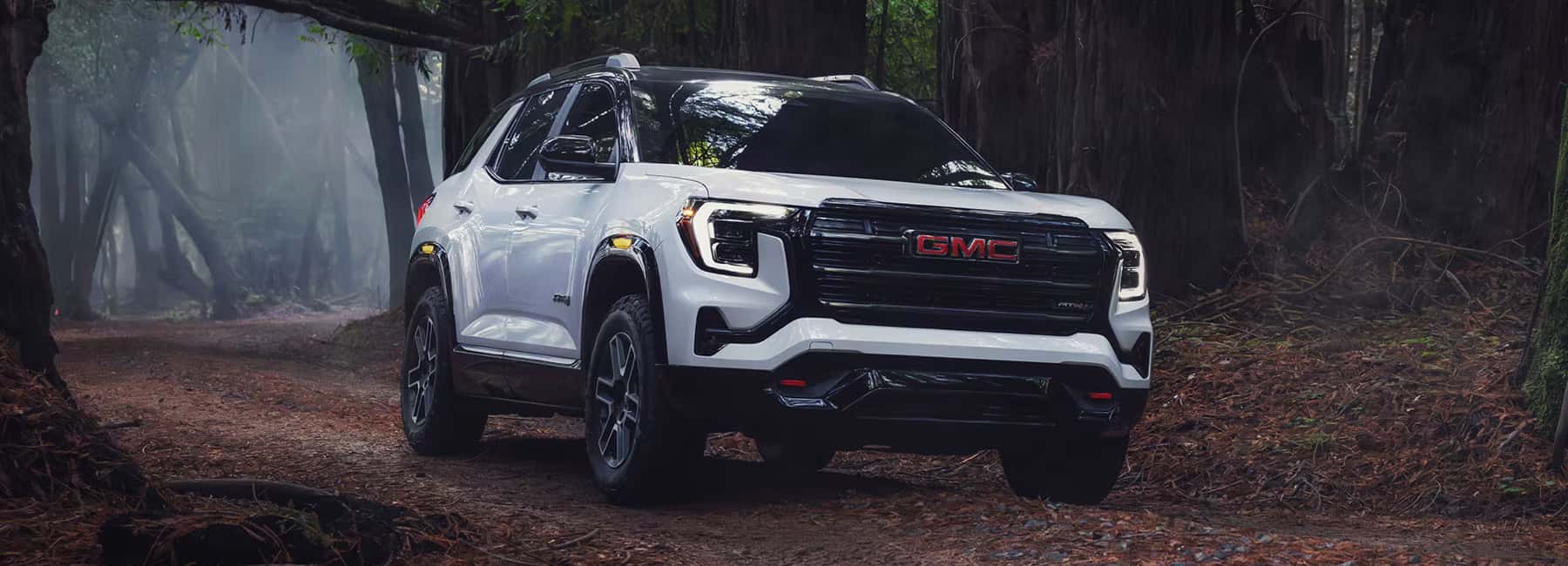 GMC Terrain drives in the woods