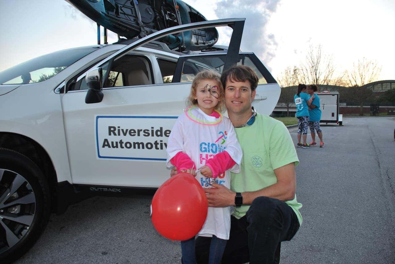 Owner Dustin Tyson and his daughter Ava at the Great Glow Run 5k